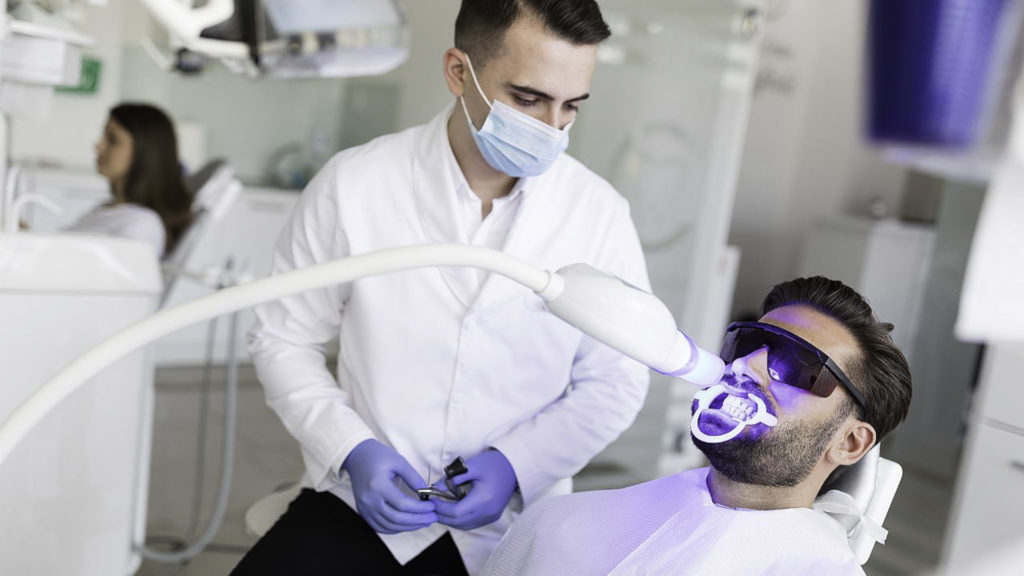 A dentist offer teeth whitening services in Utah